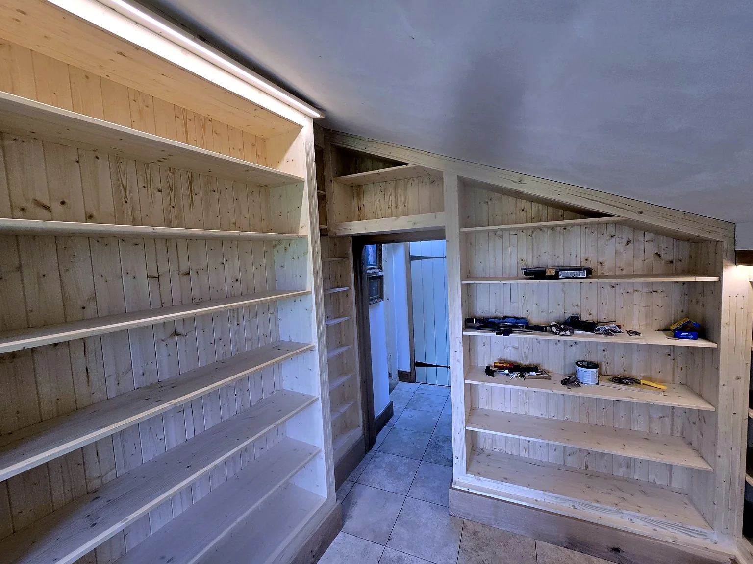 Bespoke timber shelving and alcove storage made by SM Installations