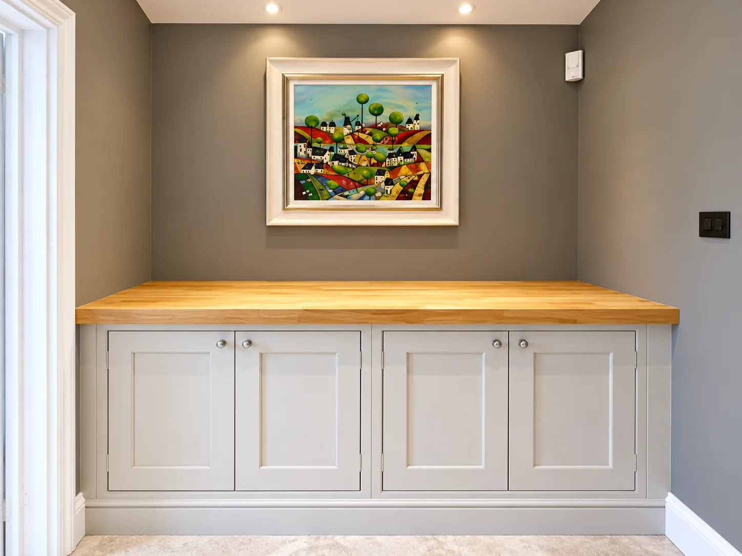 Bespoke fitted sideboard with oak worktop made by SM Installations