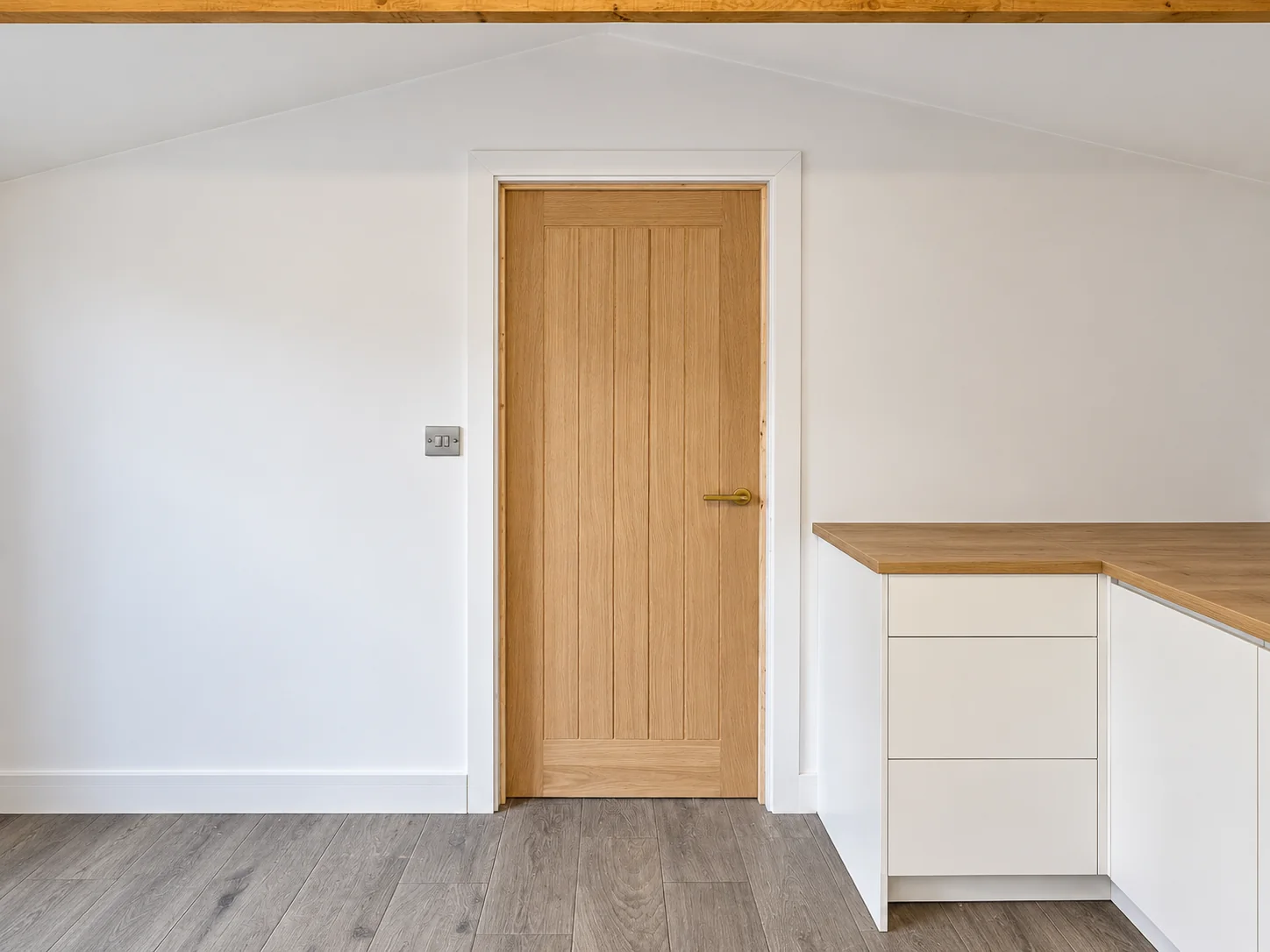 Interior oak door and fitted cabinetry completed by SM Installations