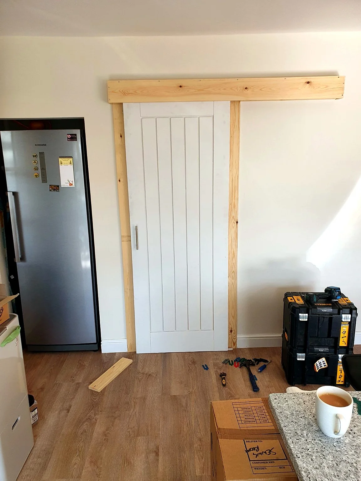 Sliding timber door fitted by SM Installations