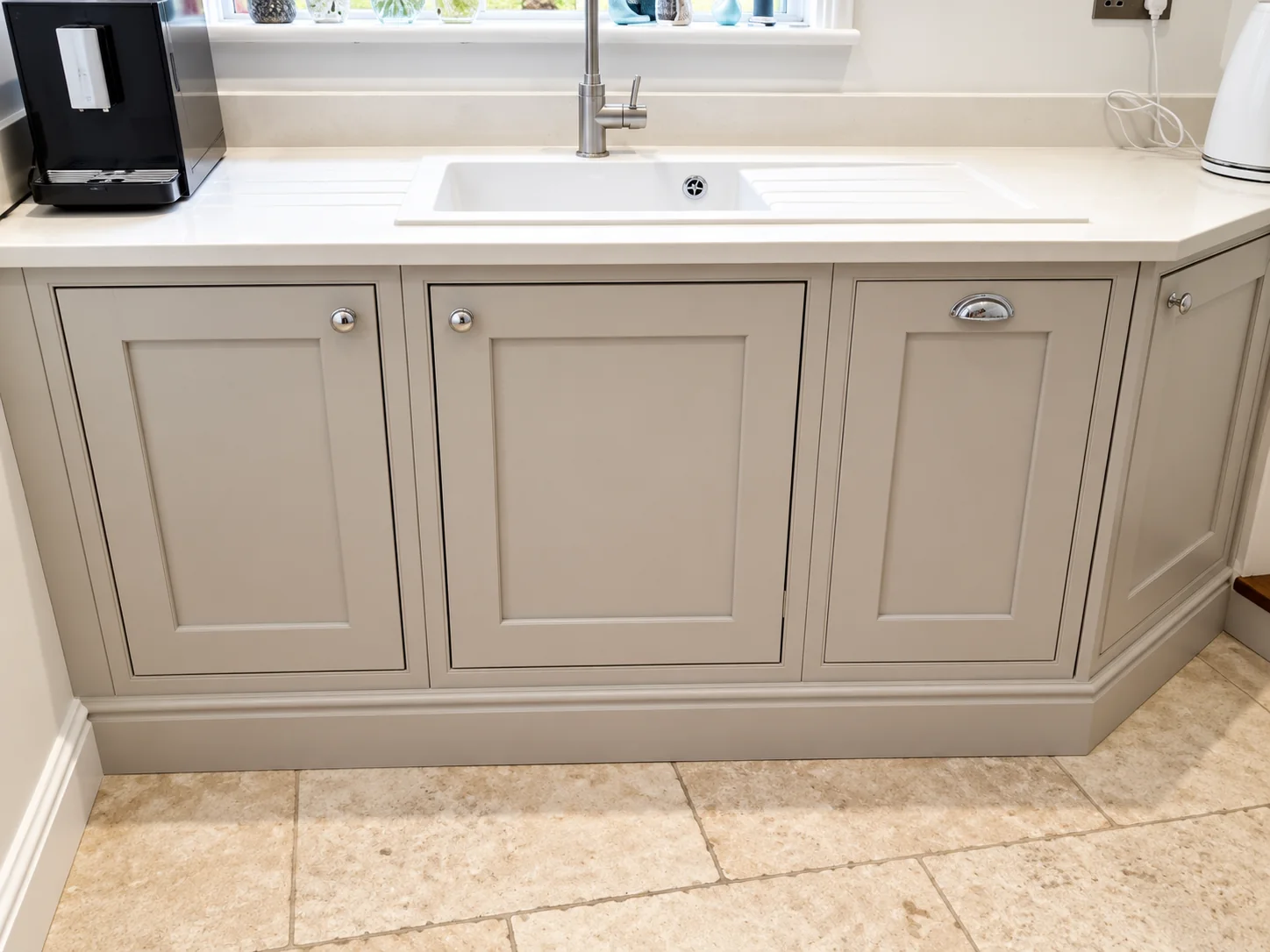 Grey fitted sink base cabinets and worktop by SM Installations
